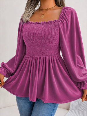 Black Forest peplum top with hip-length and pullover