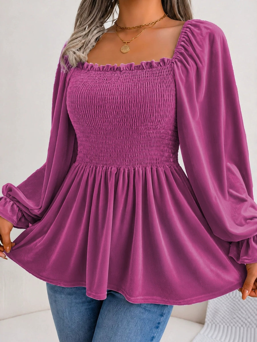 Black Forest peplum top with hip-length and pullover
