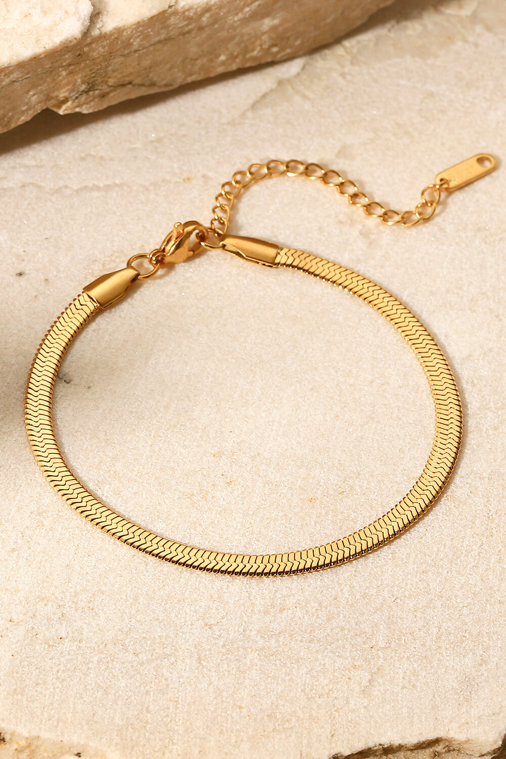 Gold herringbone chain bracelet with adjustable clasp