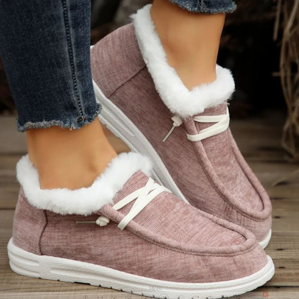 Sherpa-trimmed slip-on sneaker booties in lilac with white laces and soles.