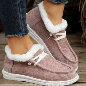Sherpa-trimmed slip-on sneaker booties in lilac with white laces and soles.