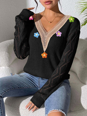Black relaxed pullover sweater with v-neck