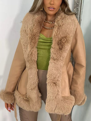 Beige belted faux fur trim coat with textured faux leather.