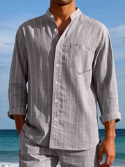 Men's grey linen-blend striped button-up shirt with band collar and chest pocket.
