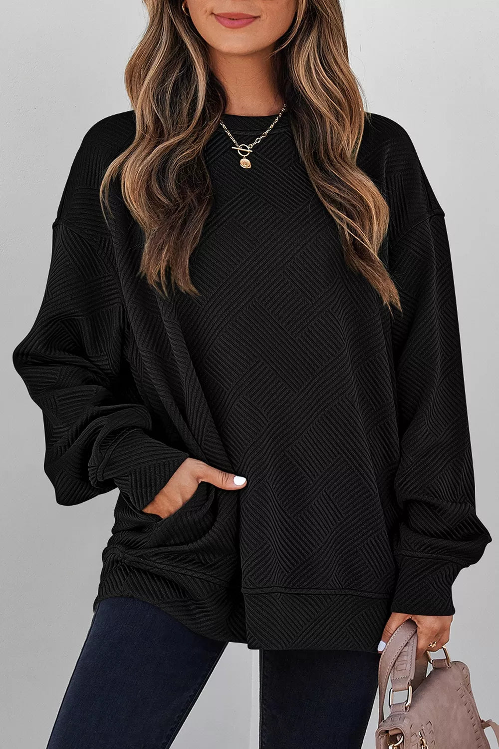 black sweatshirt with geometric and round neck