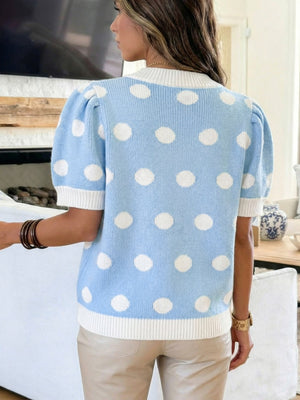 Blue polka dot knit sweater with puff sleeves and white trim