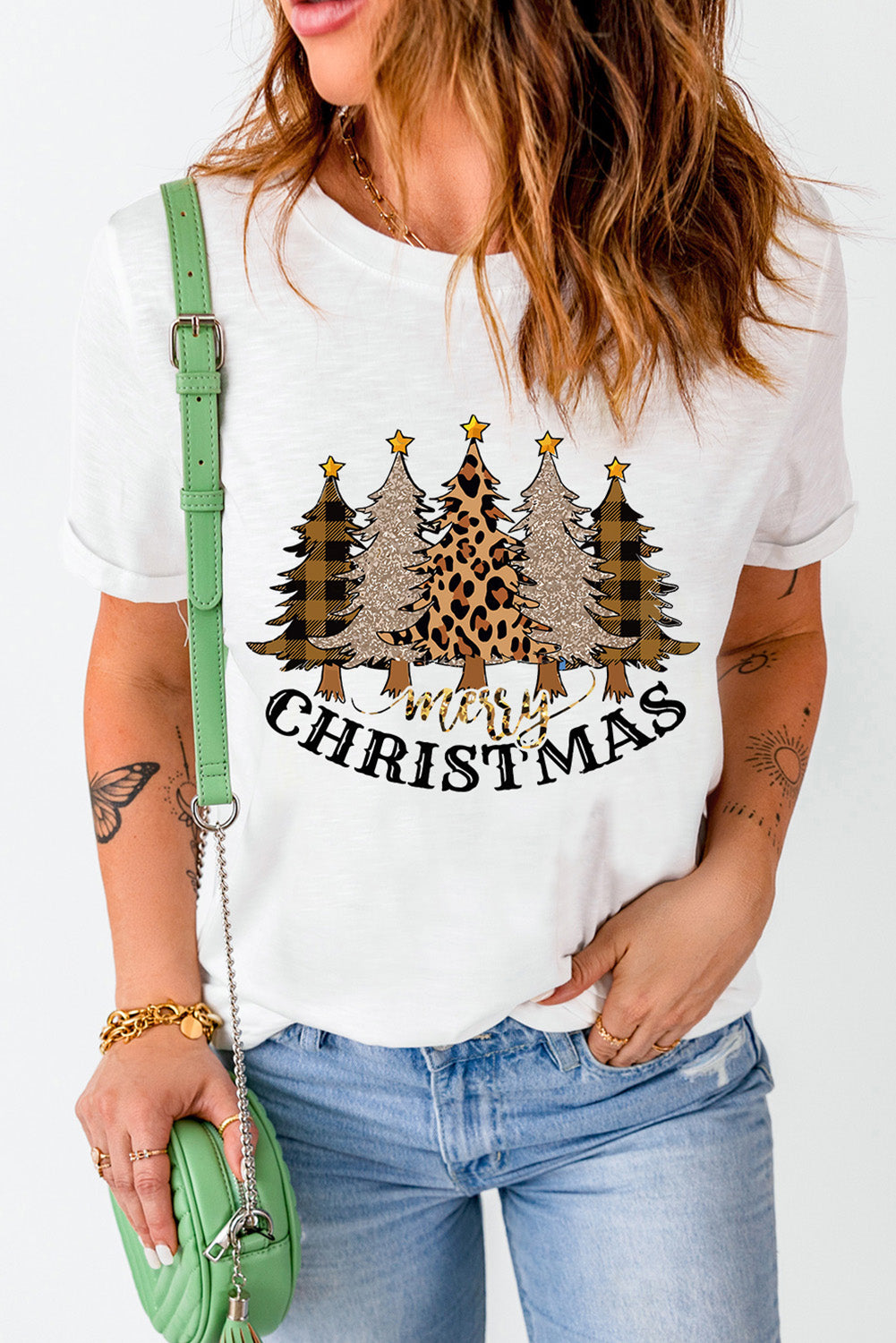 White graphic tee with textured Christmas trees and Merry Christmas text