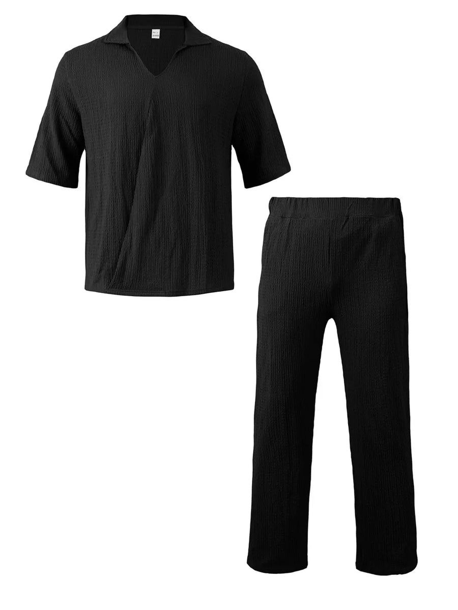 Black textured knit short sleeve polo shirt and wide leg pants set.