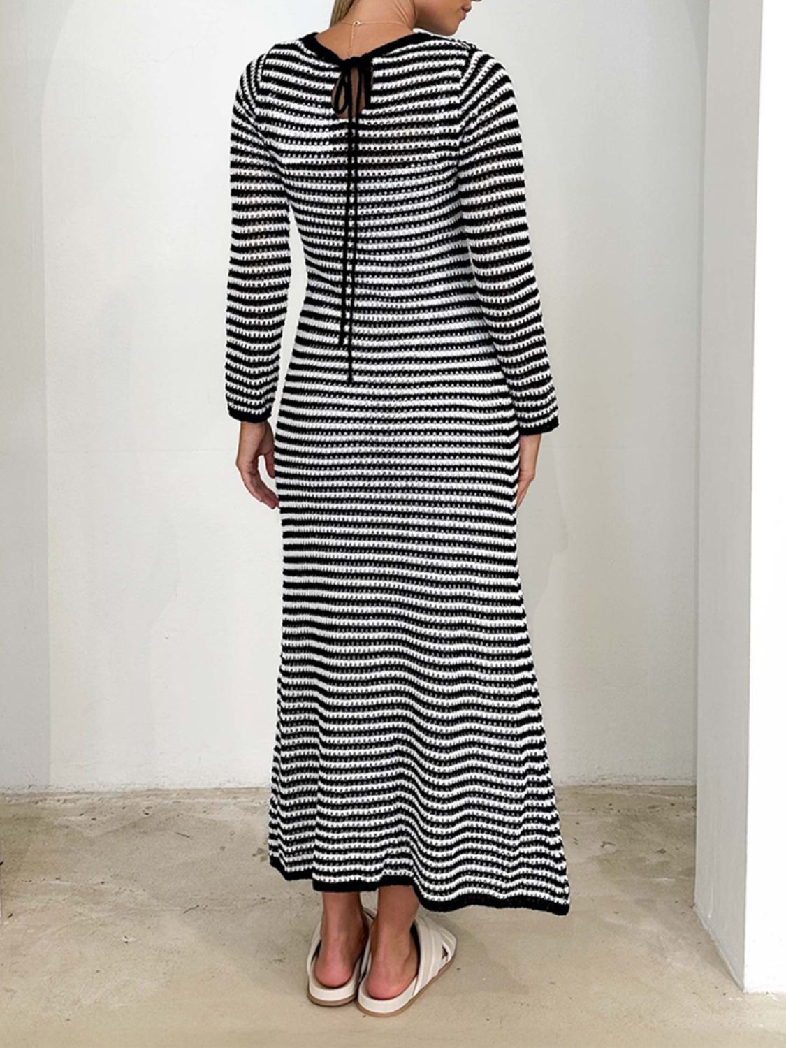 Black and white striped maxi sweater dress with back tie detail