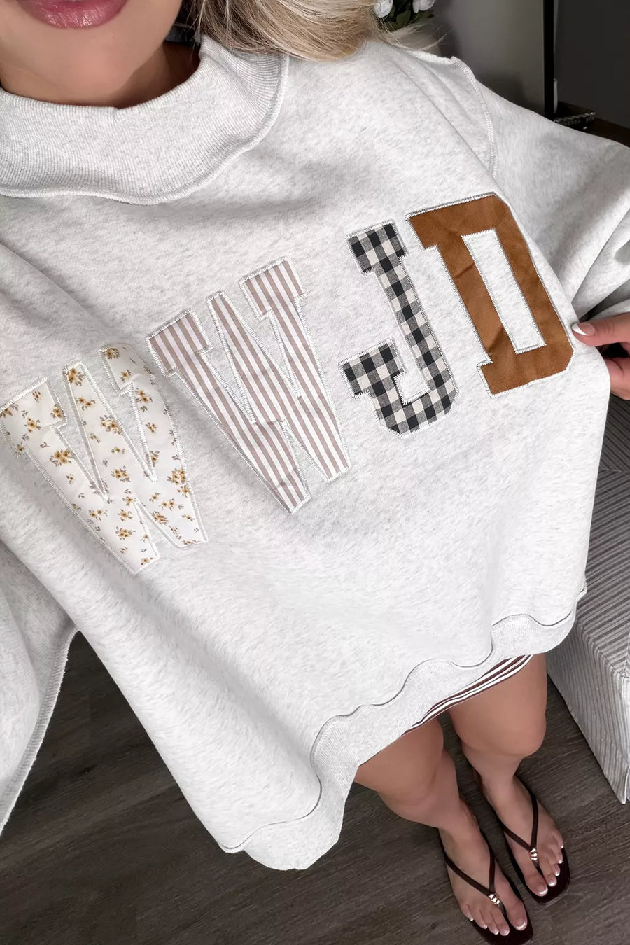 50% polyester, 50% cotton Care instructions: Machine wash cold sweatshirt in brown with loose silhouette