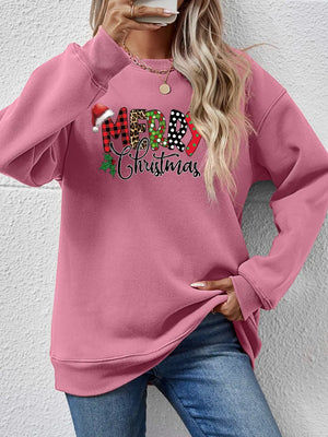 Blush pink sweatshirt with festive Merry Christmas graphic, drop shoulder, and brushed fleece.