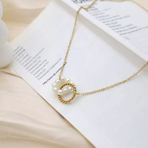 gold necklace with collar length and clasp