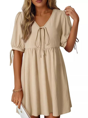 Apricot tied neck puff sleeve mini dress with tie details on sleeves