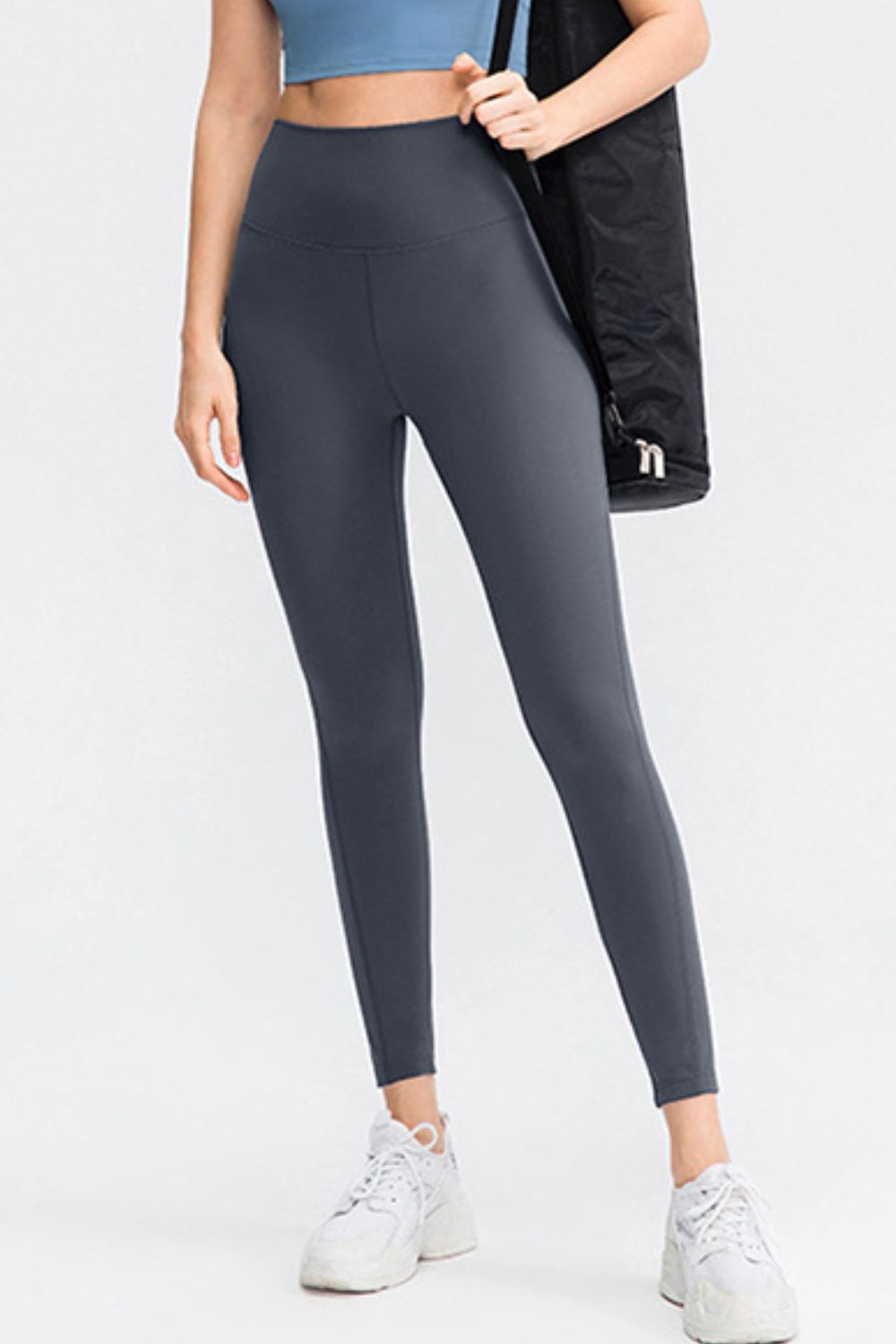 Sculpted Fit high-waist performance leggings in dark gray.