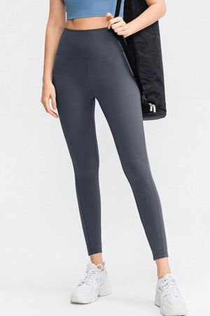 Sculpted Fit high-waist performance leggings in dark gray.