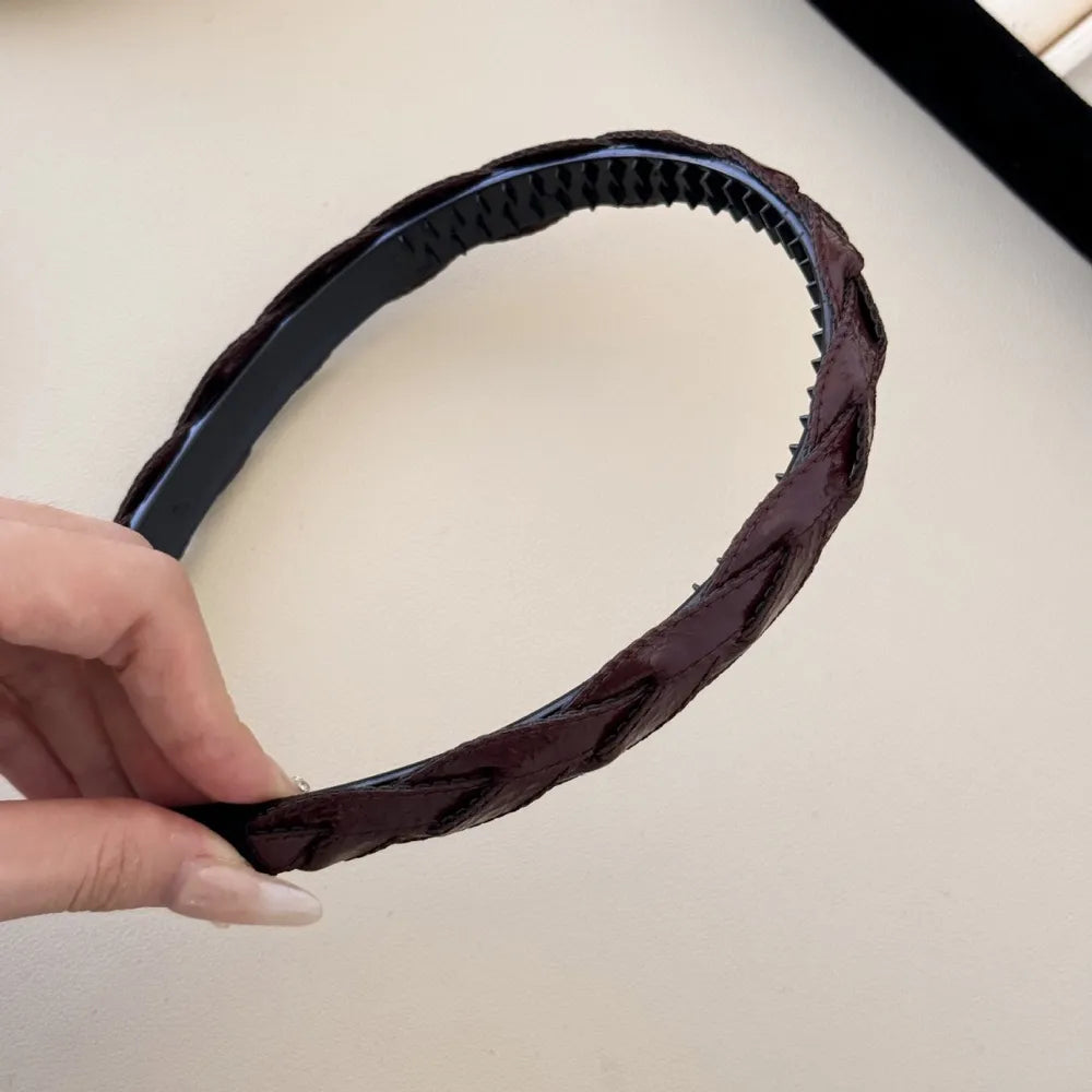 Woven faux leather headband in burgundy with braided detail