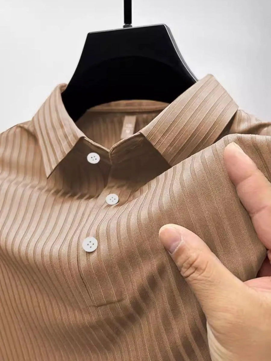 Textured ribbed polo shirt in Khaki with buttoned placket and spread collar.