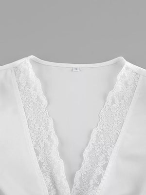 White mini dress with mini and tie, button-front