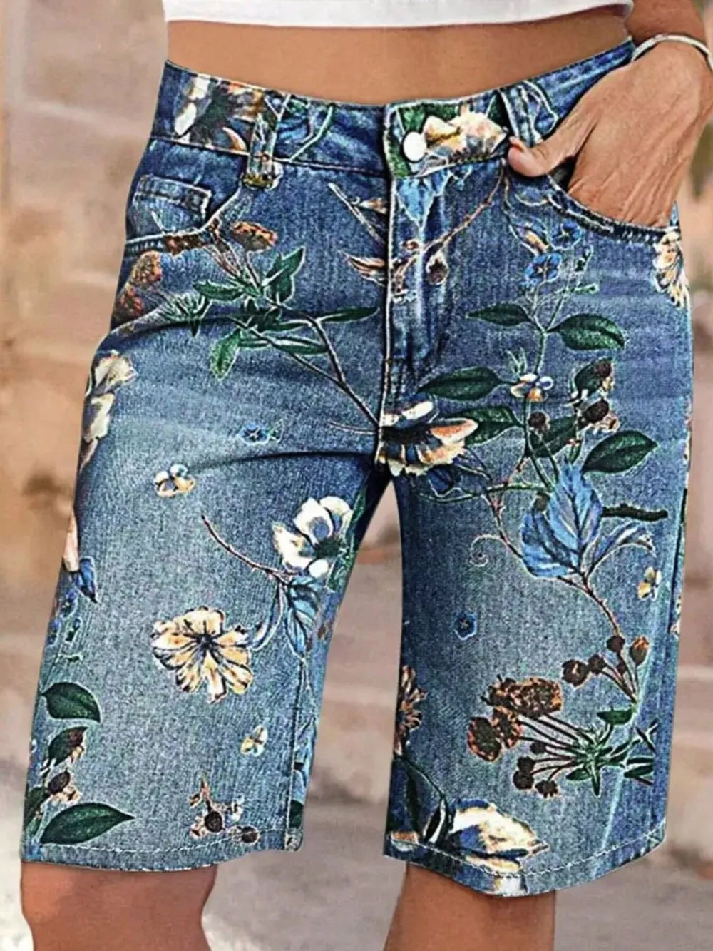 Blue botanical print relaxed fit denim shorts with a comfortable cotton blend.