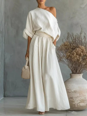 two-piece set in cream featuring pocketed and relaxed fit
