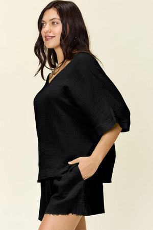 Black textured cotton half sleeve top and drawstring shorts set with v-neck