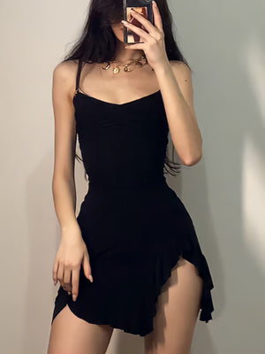 Black asymmetrical ruched mini dress with a dynamic silhouette and a high slit.