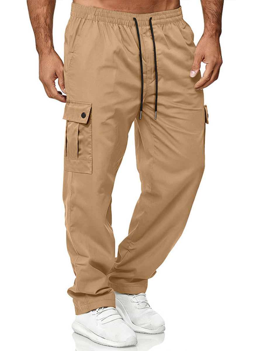 Khaki cargo pants with adjustable waist and drawstring, featuring multiple pockets.