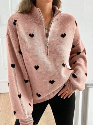 blush pink pullover sweater with heart-print and mock neck