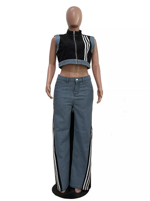 Chic zip-front crop top and wide-leg jeans set with side stripes.