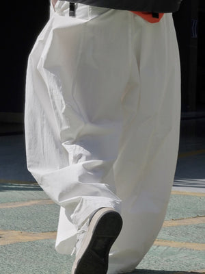 Cotton content is at least 95% wide-leg pants in Army Green with wide-leg silhouette