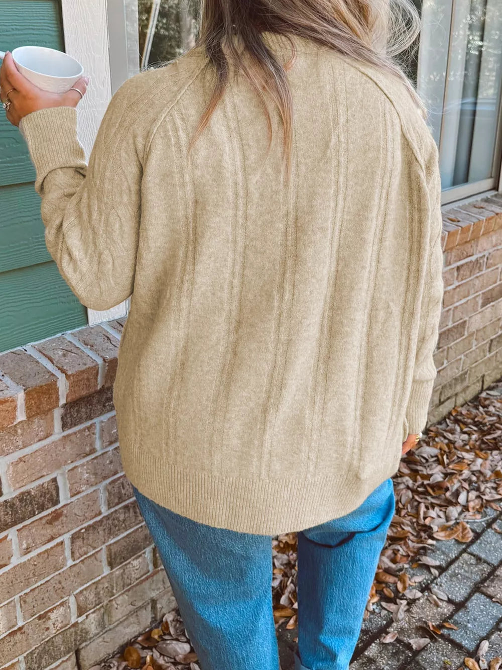 52% viscose, 26% polyester, 22% polyamide Care instructions: Machine wash cold pullover sweater in light beige with