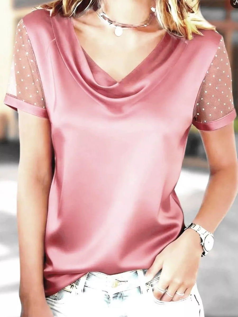 Pink cowl neck blouse with sheer, dotted sleeves and satin finish.