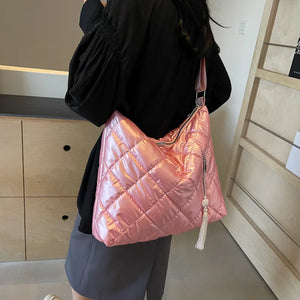 Pink diamond quilt padded shoulder bag with tassel detail