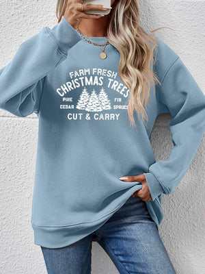 Misty Blue graphic print crewneck sweatshirt with Christmas trees and text.