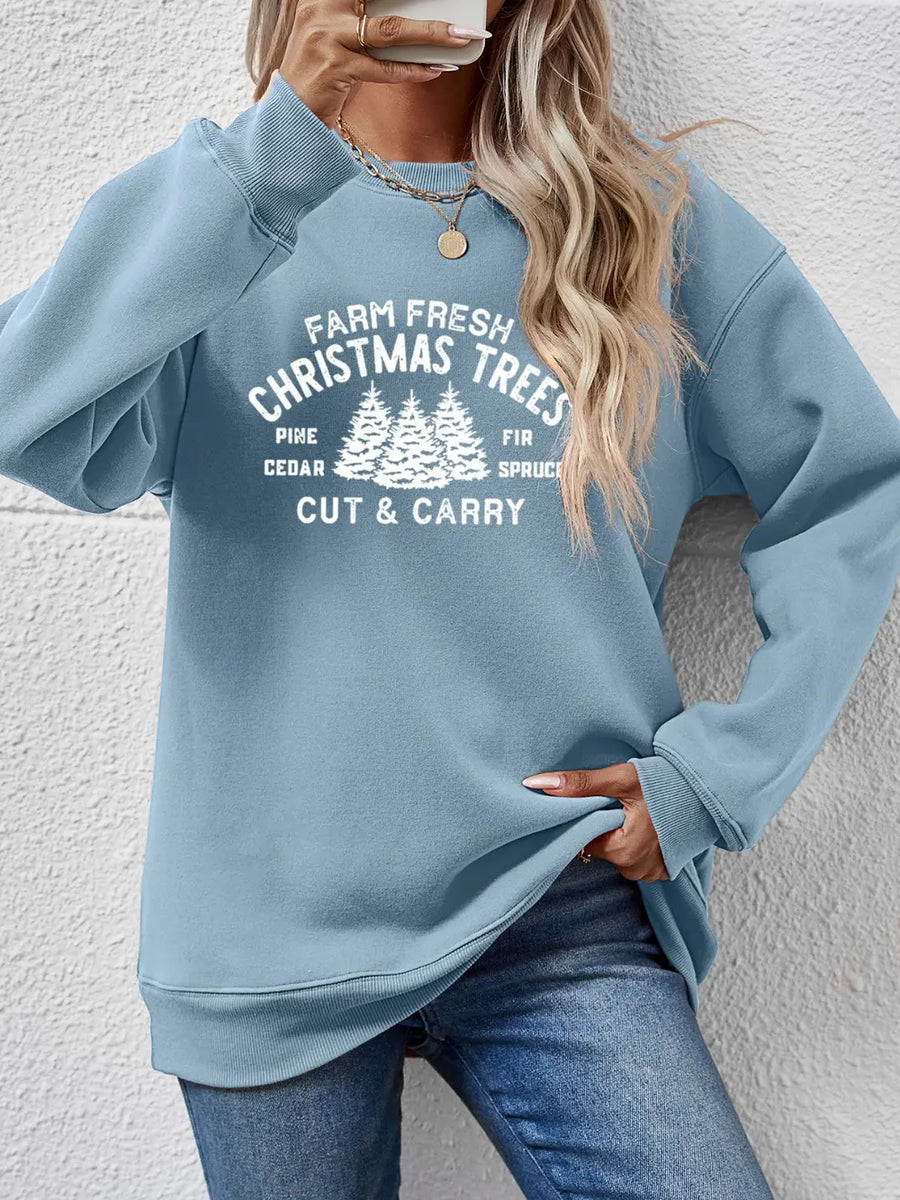 Misty Blue graphic print crewneck sweatshirt with Christmas trees and text.