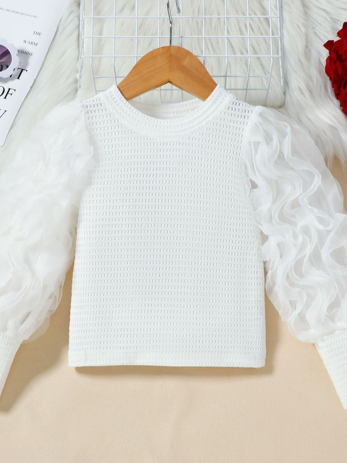 White textured top with sheer ruffled puff sleeves