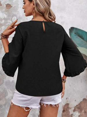 Black ruffled sleeve blouse with button detail and keyhole back.