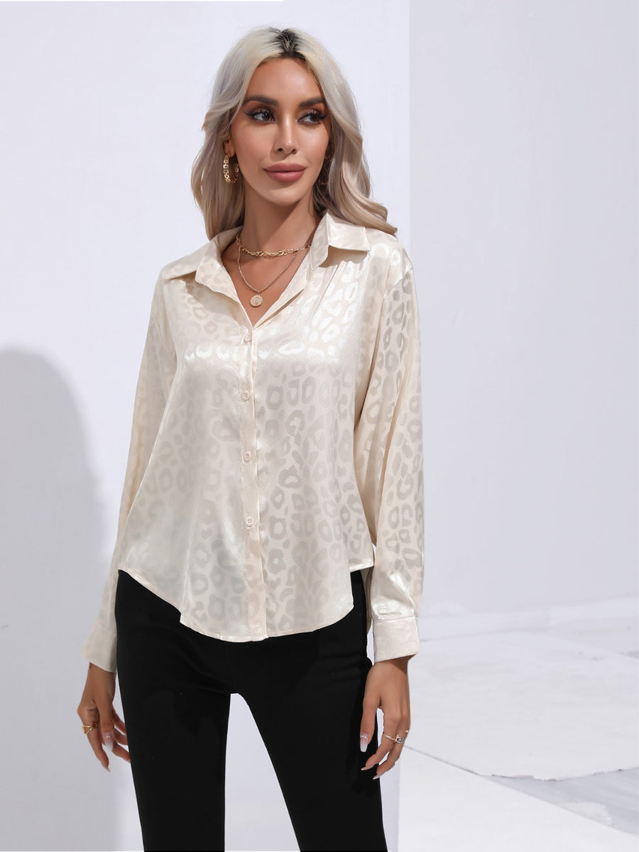Champagne satin leopard print button-down shirt with a collared neckline.