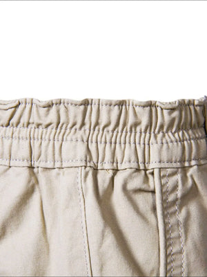 Khaki chino shorts with elastic waistband and contrast stitching detail