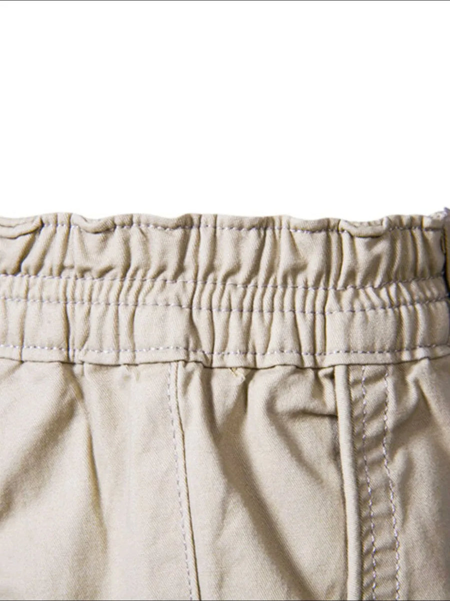 Khaki chino shorts with elastic waistband and contrast stitching detail