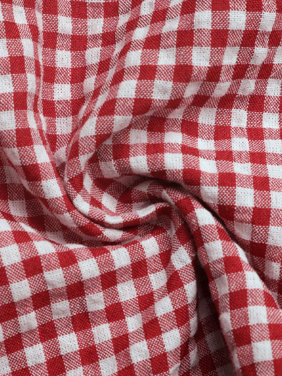 Gingham tie-front bustier top in deep red and white checkered fabric.