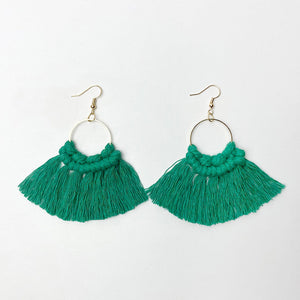 Macramé leaf fringe statement earrings in green with gold hoops.