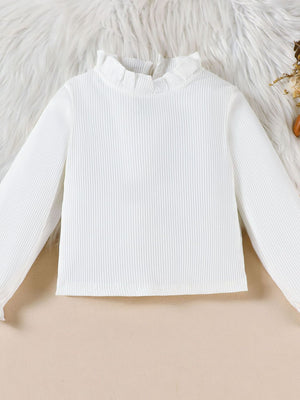 White ribbed long sleeve top with ruffled mock neck and cuffs