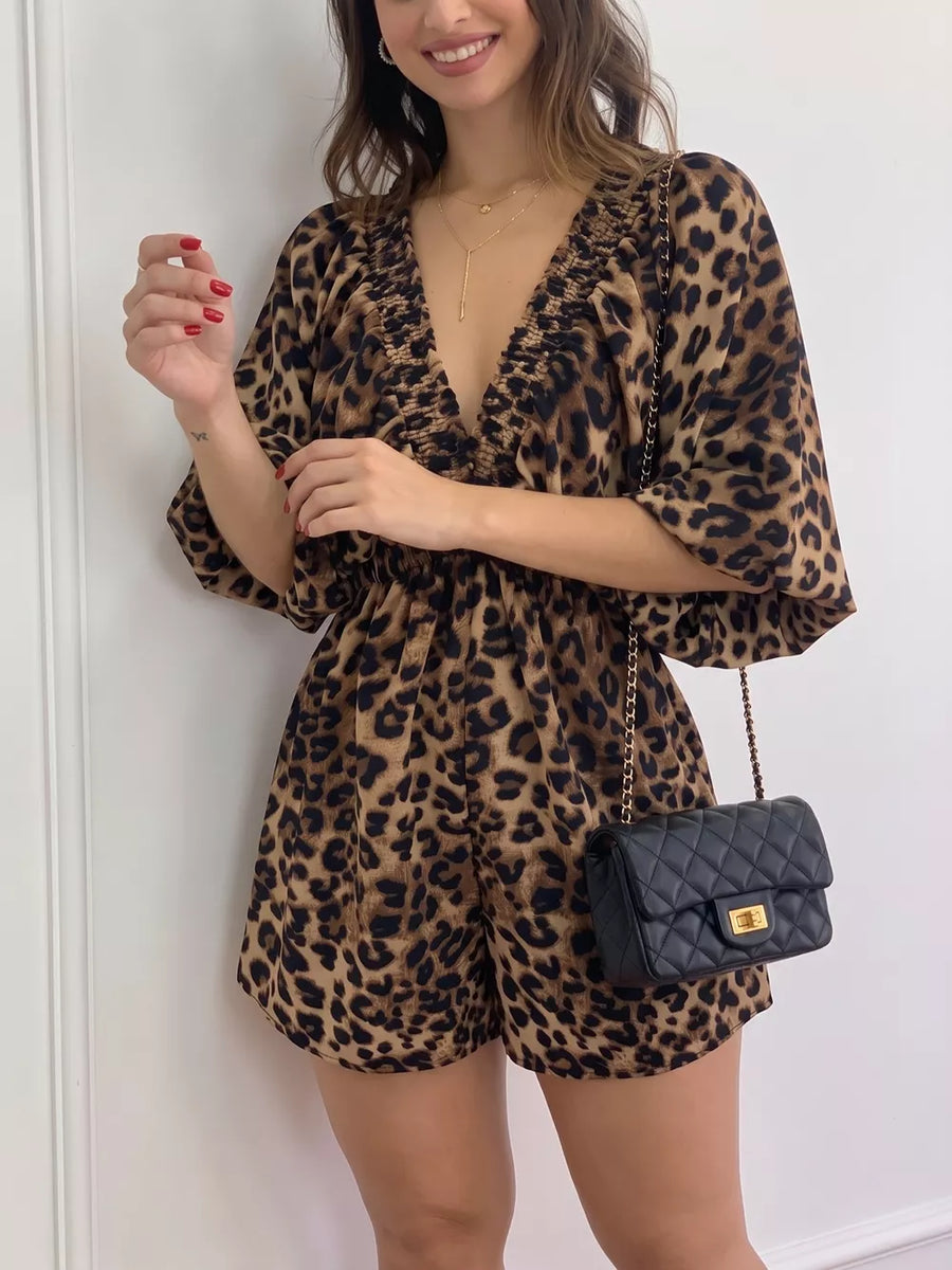 100% polyester Care instructions: Machine wash cold romper in brown with relaxed silhouette