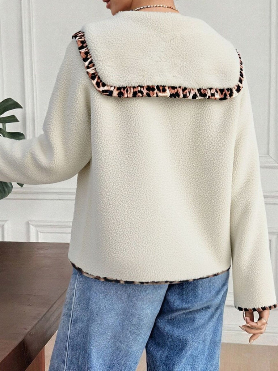 cream jacket with waist-length and button-front