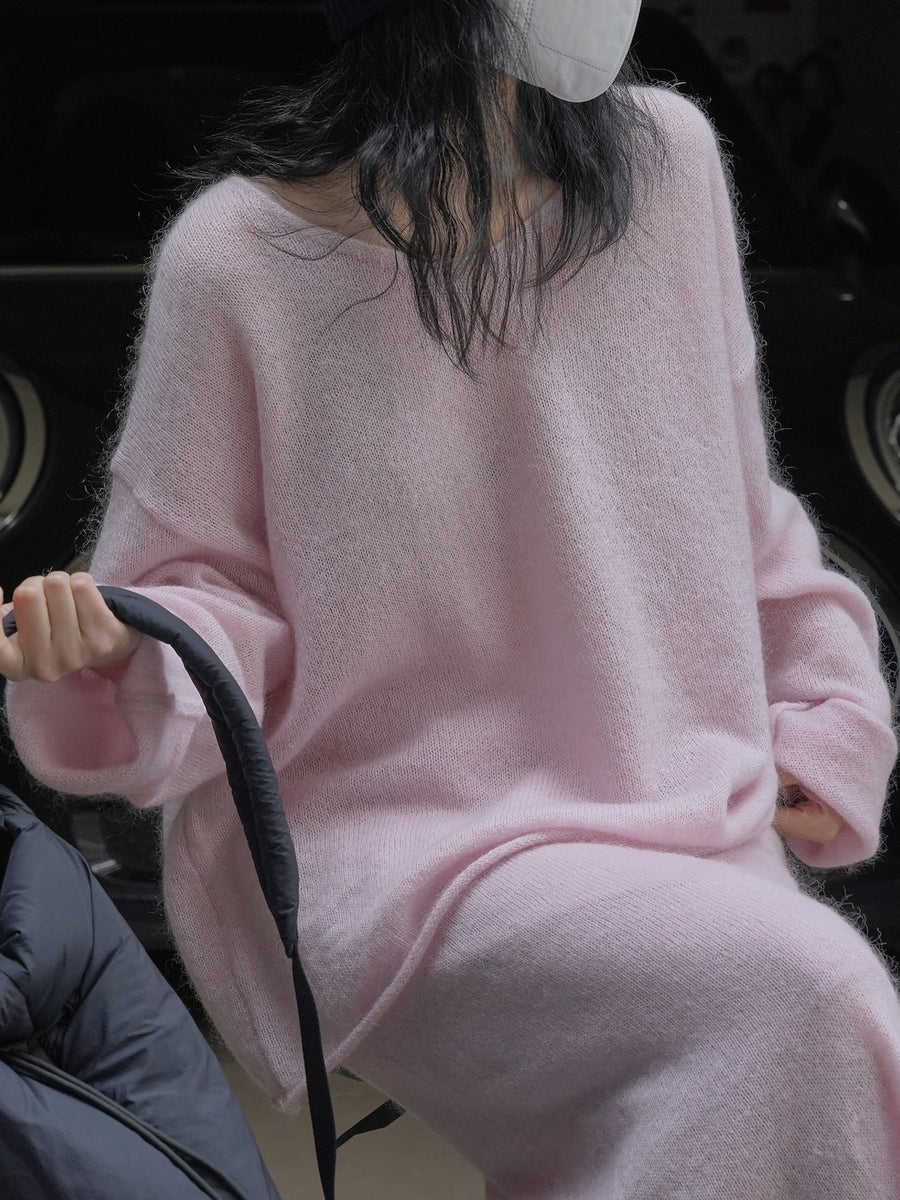 light pink pullover sweater with hip-length and pullover