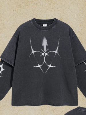Black distressed graphic tee with layered sleeves and abstract white print.