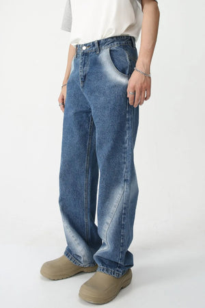Faded Panel Wide-Leg Jeans in medium wash denim with a relaxed fit and faded panel details.