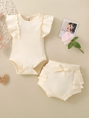 Cream ribbed baby set with ruffled flutter sleeves and tiered ruffle bloomers with bow detail.