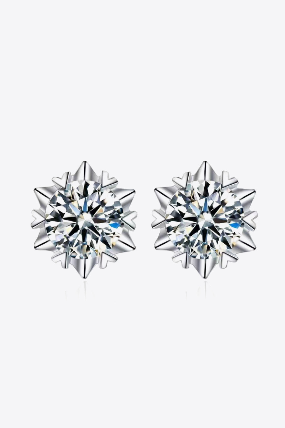 Silver stud earrings with celestial cut moissanite gems
